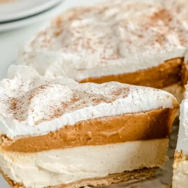 No-bake pumpkin pie topped with whipped cream and cinnamon