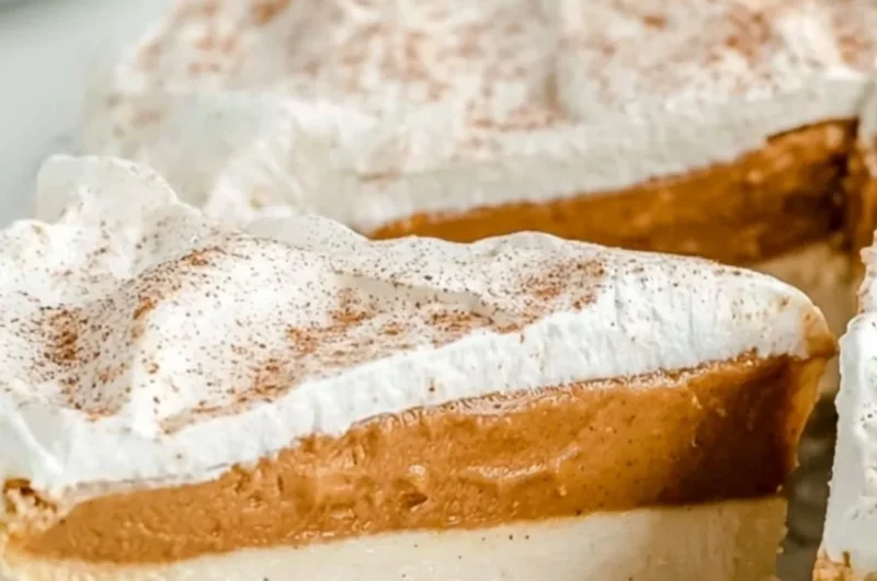 No-bake pumpkin pie topped with whipped cream and cinnamon