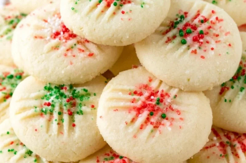 Cozy whipped shortbread cookies decorated with festive sprinkles