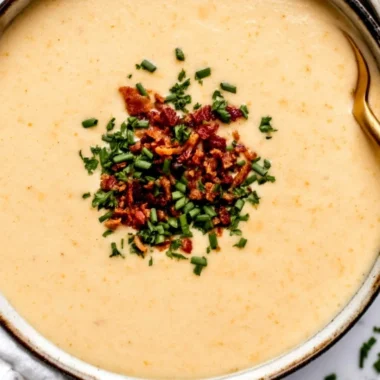 High-protein cream of protein soup in a bowl with herbs and spices