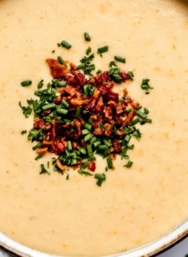 High-protein cream of protein soup in a bowl with herbs and spices