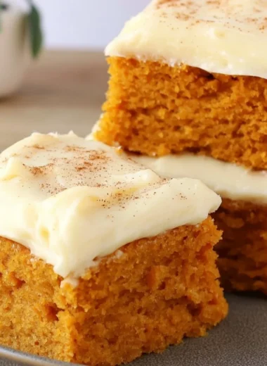 Delicious pumpkin bars recipe by Paula Deen, perfect for fall desserts.