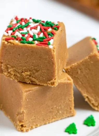 Delicious warm gingerbread fudge topped with festive decorations.