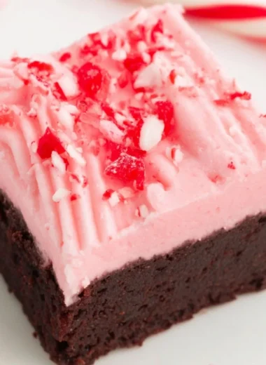 Delicious candy cane brownies topped with festive crushed peppermint.