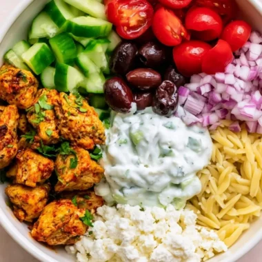High-protein chicken gyro bowl with fresh ingredients for a healthy lunch.
