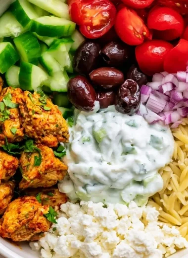 High-protein chicken gyro bowl with fresh ingredients for a healthy lunch.