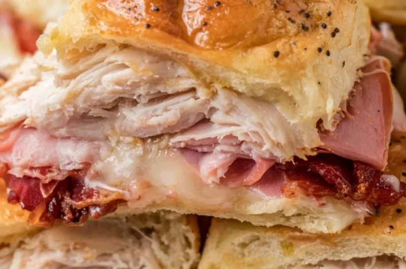 Delicious buttery baked club sliders served on a platter