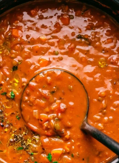 Bowl of Mediterranean Lentil Soup with fresh herbs and spices