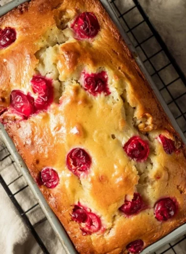 Freshly baked Mom's Cranberry Walnut Bread with cranberries and walnuts