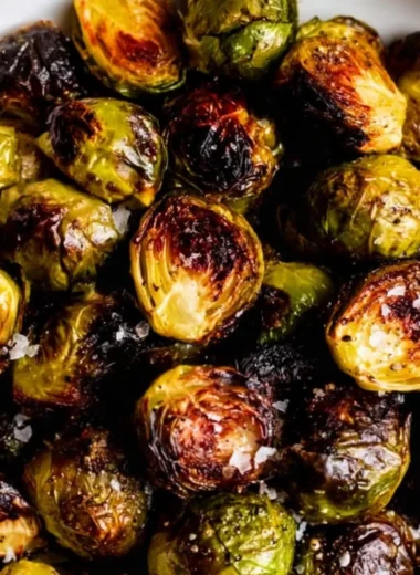 Plate of delicious roasted Brussels sprouts with a golden-brown crisp