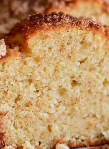 Delicious spiced Eggnog Loaf served with festive decorations