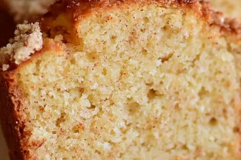 Delicious spiced Eggnog Loaf served with festive decorations