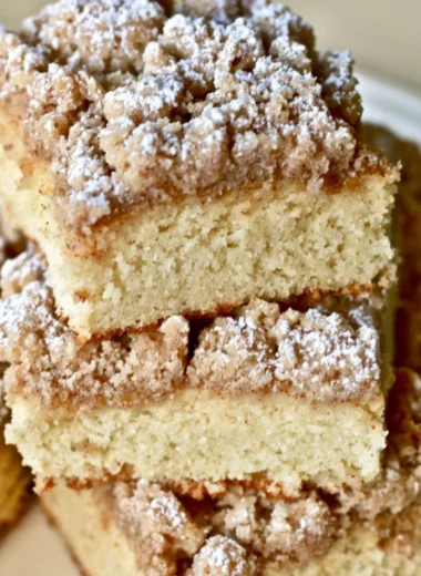 Delicious slice of New York Crumb Cake with a buttery crumble topping